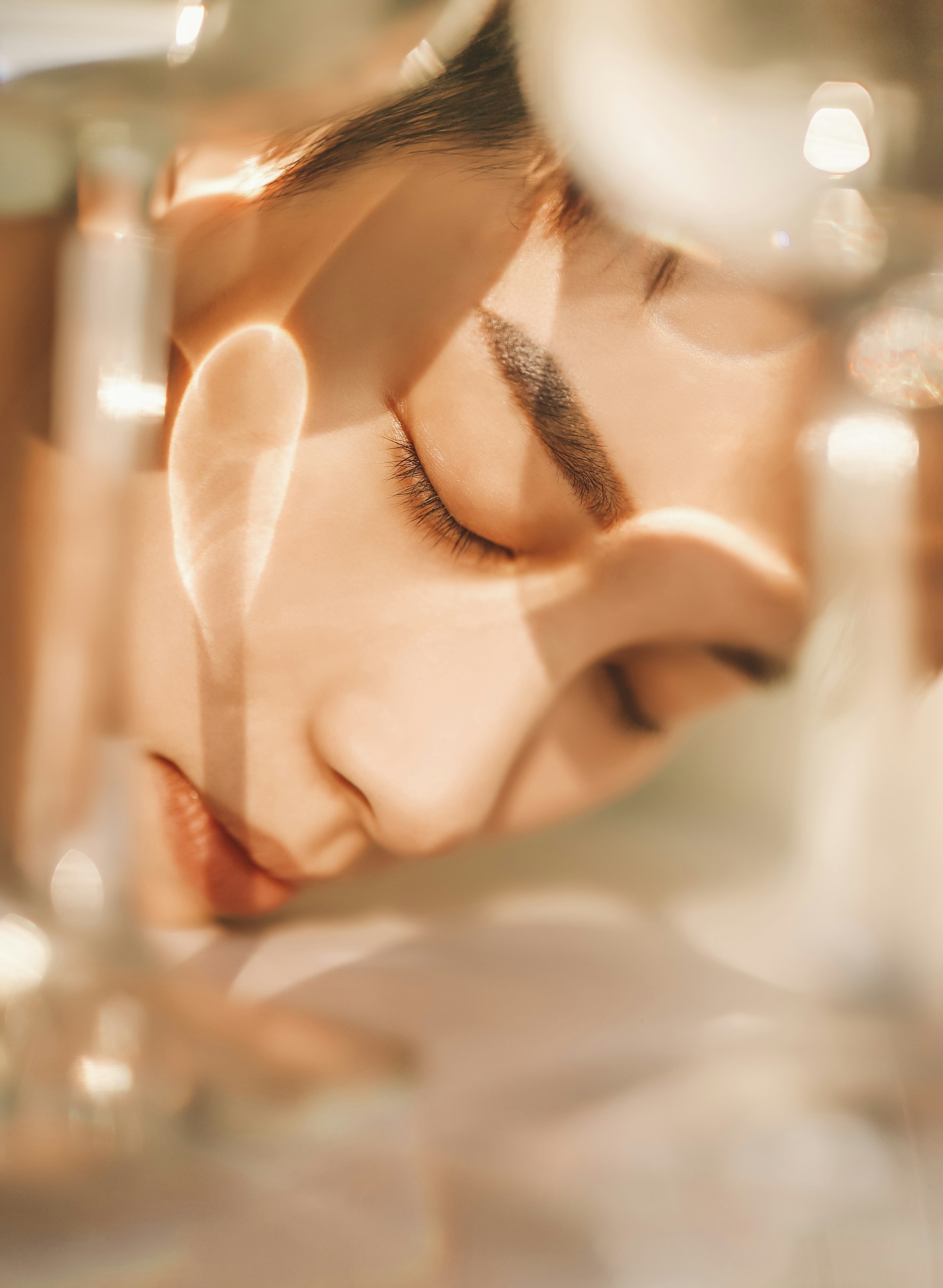 A guest relaxing with headphones during a calming oral wellness visit